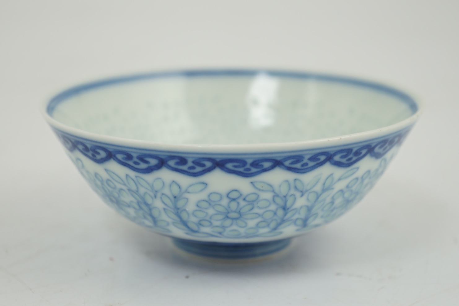 A Chinese blue and white ‘rice grain’ bowl, Jiaqing mark and possibly of the period